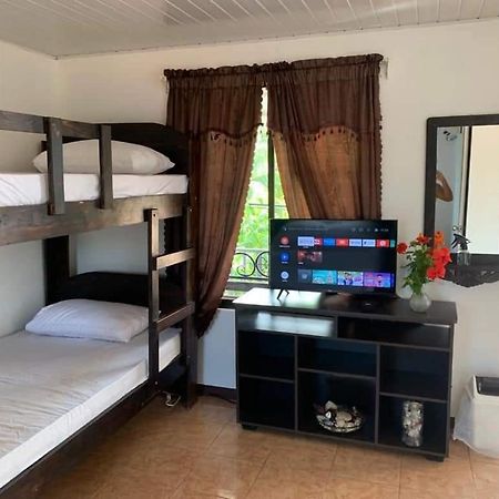 Апарт отель Cabinas Playa Bandera Паррита Экстерьер фото